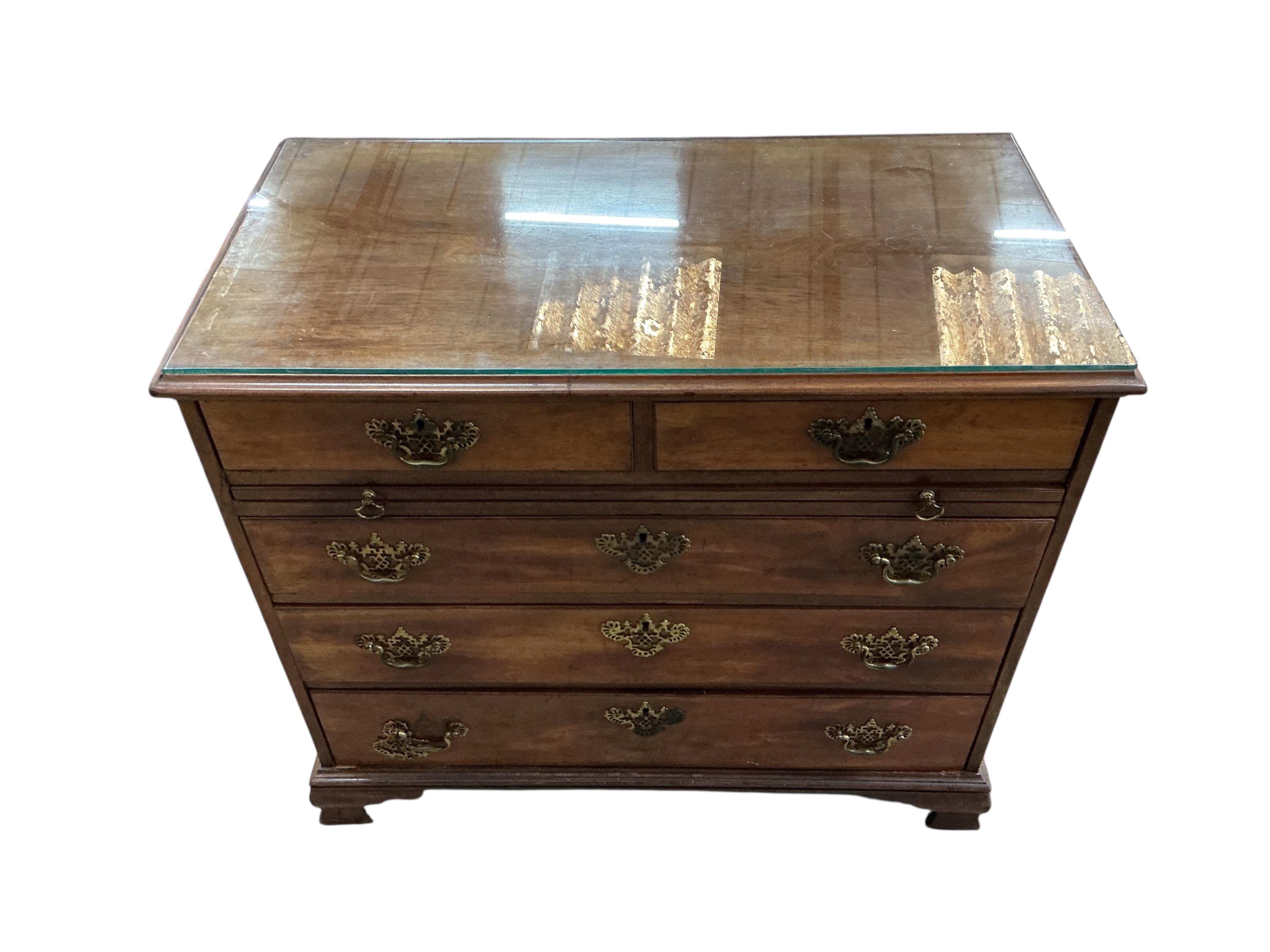 A George III mahogany chest with brushing slide, width 97cm, depth 50cm, height 86cm